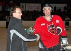 Janos Kaszala, who previously played for the Ferencvaros and Dunaferr clubs, is pictured receiving his league MVP Award after the New Zealand National League final.